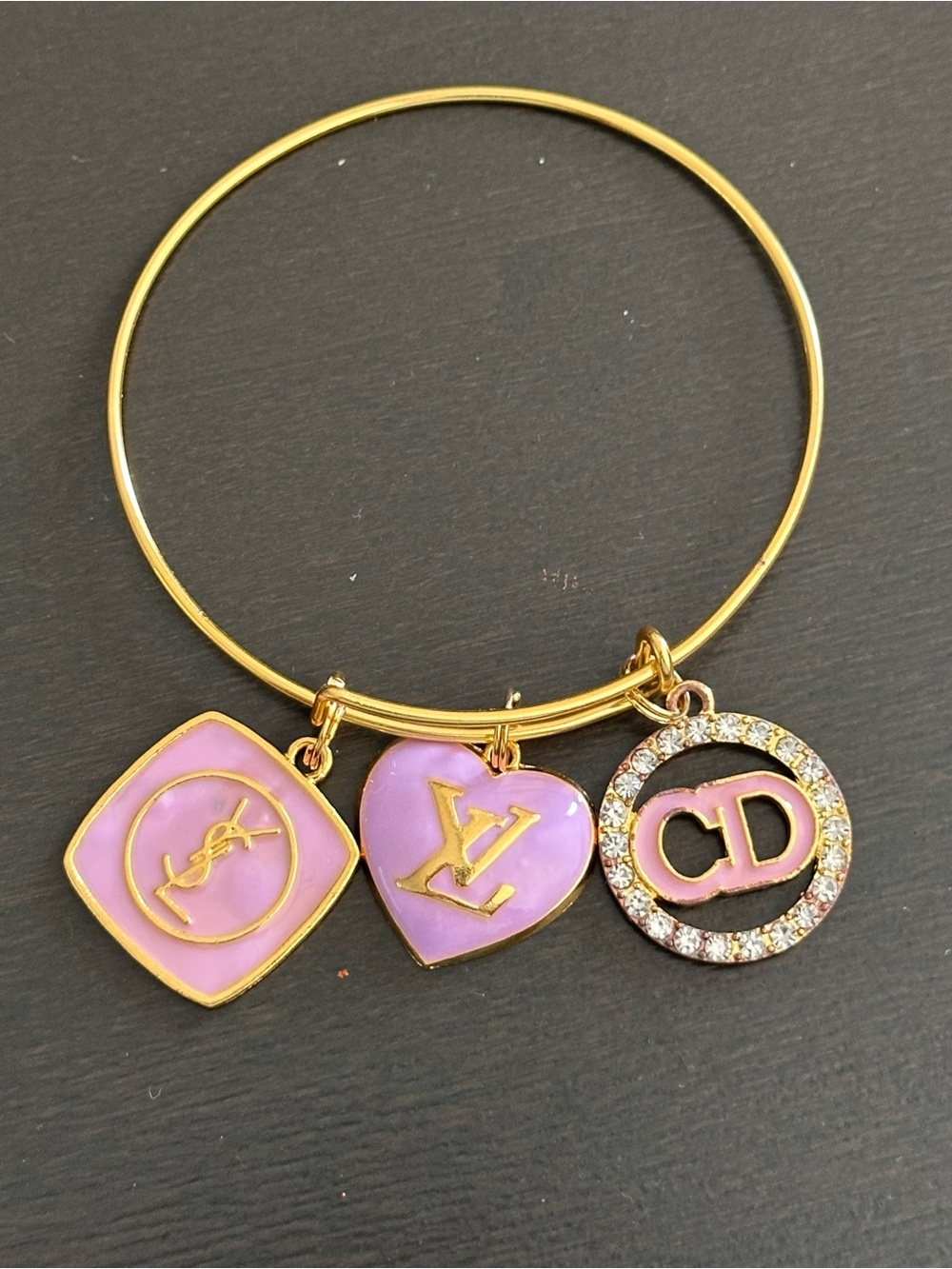 Gold-Tone Charm Bangle Bracelet with Black Enamel Accents